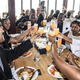 The New York Urban League Black & White Champagne Brunch participants raise a glass on Sept. 16, 2017. (Malik Yusef Cumbo/MYC Photographics)